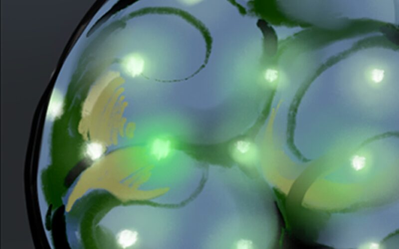 Close-up of the artifact: a translucent sphere lit from inside by coloured LEDs